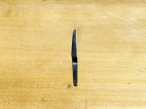 Steel staple from inside of drawer.